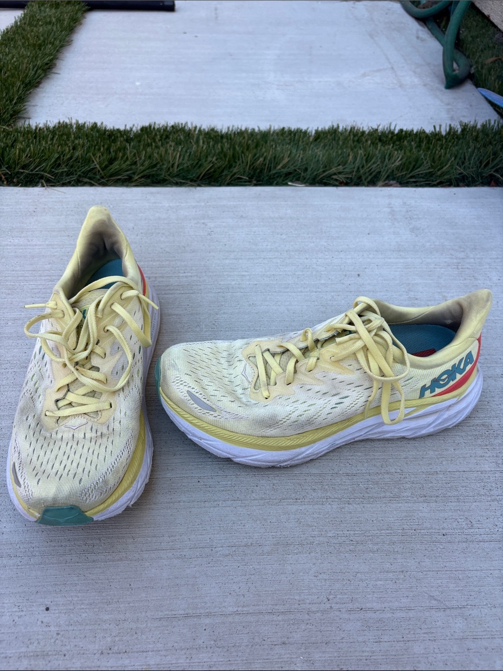 Hoka Women's Pale Yellow Athletic Running Shoes with Teal Accent (size 9)